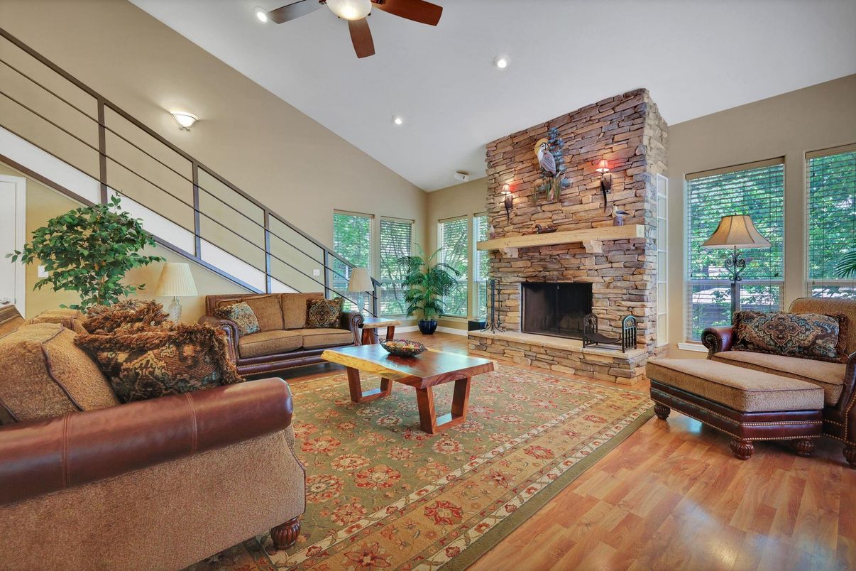 Fireplace, Interior, Living room, Recessed Lighting, Stone Walls, Wood Texture Flooring
