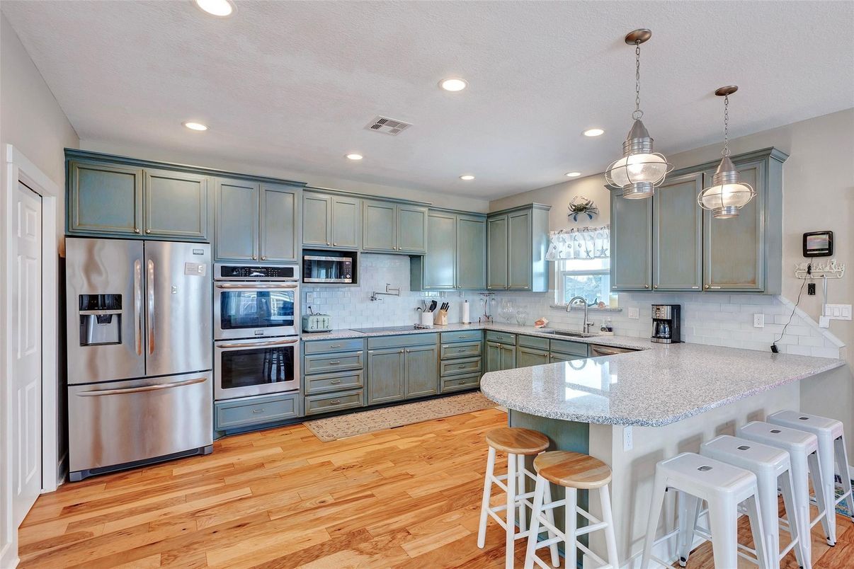 Interior, Kitchen, Pendant Lights, Recessed Lighting, Stainless Steel Appliances, Wood Texture Flooring