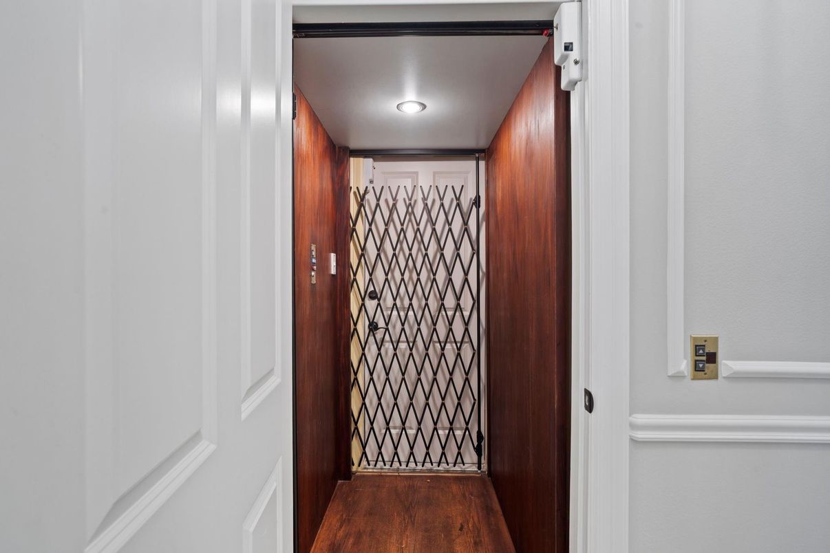 Elevator, Interior, Recessed Lighting, Wood Texture Flooring, Wooden Walls
