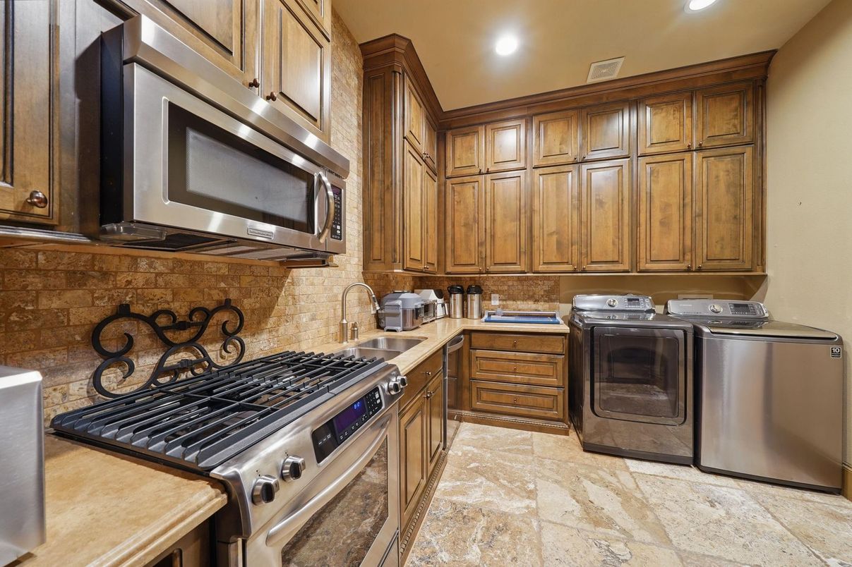 Interior, Kitchen, Recessed Lighting, Stainless Steel Appliances, Stone Walls, Washer