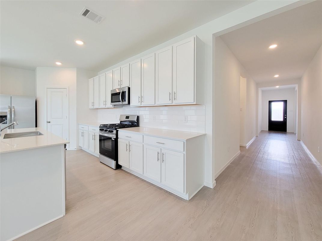 Interior, Kitchen, Recessed Lighting, Stainless Steel Appliances, Wood Texture Flooring