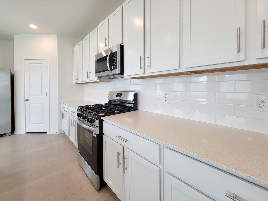 Interior, Kitchen, Recessed Lighting, Stainless Steel Appliances, Wood Texture Flooring