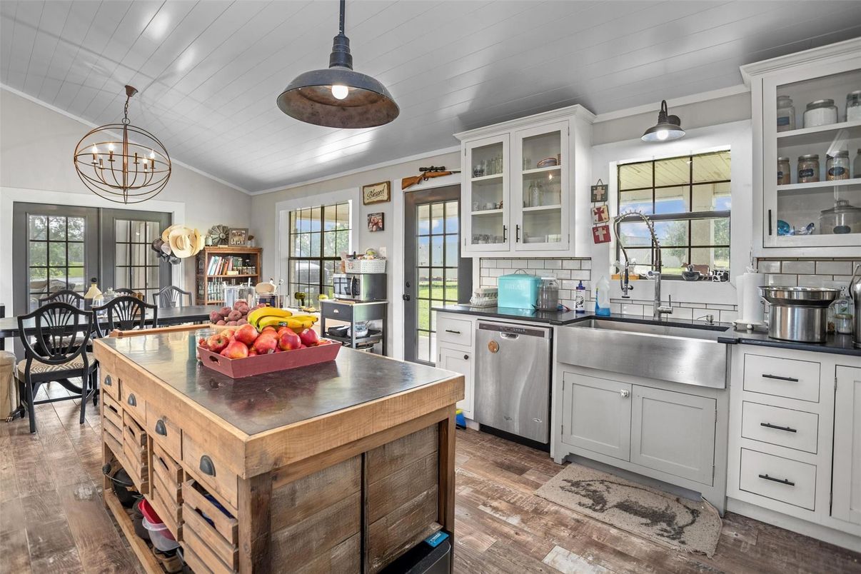 Dining room, Interior, Kitchen, Pendant Lights, Stainless Steel Appliances, Wood Texture Flooring