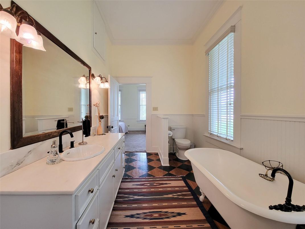 Bathroom, Dual Sink Vanities, Free Standing Baths, Interior, Wood Texture Flooring