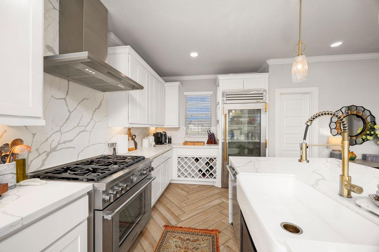 Interior, Kitchen, Marble Walls, Pendant Lights, Recessed Lighting, Stainless Steel Appliances, Wood Texture Flooring