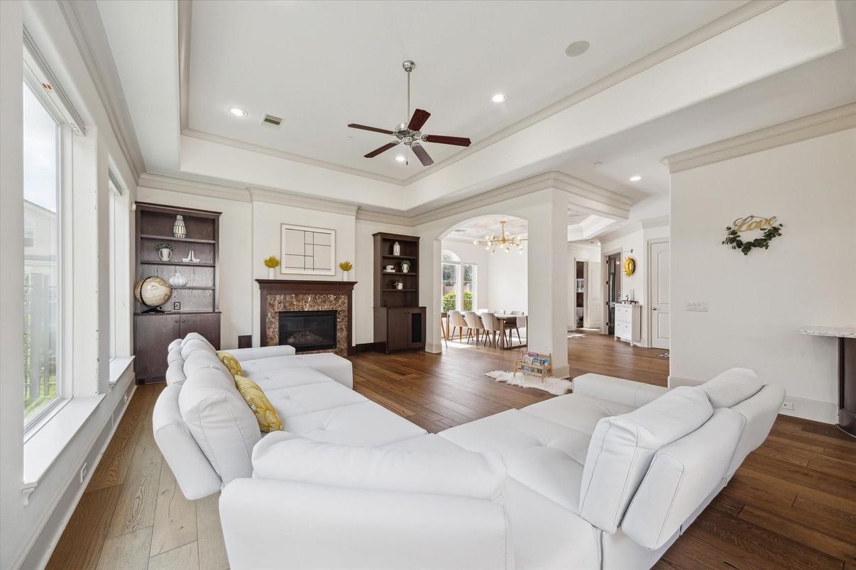 Chandelier, Dining room, Fireplace, Interior, Living room, Recessed Lighting, Wood Texture Flooring