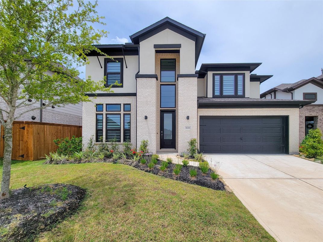 Attached, Exterior, Facade, Brick Facade, Modern