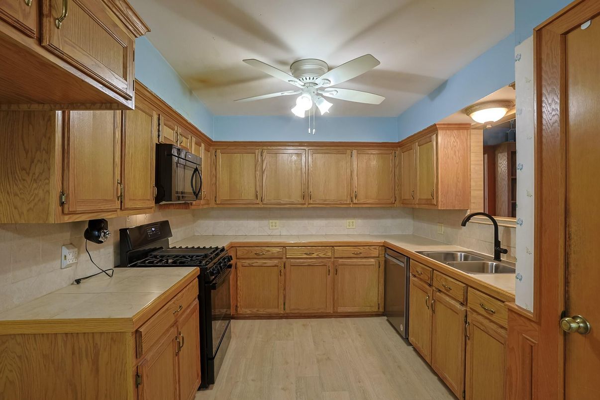 Interior, Kitchen, Tile Countertops, Wood Texture Flooring