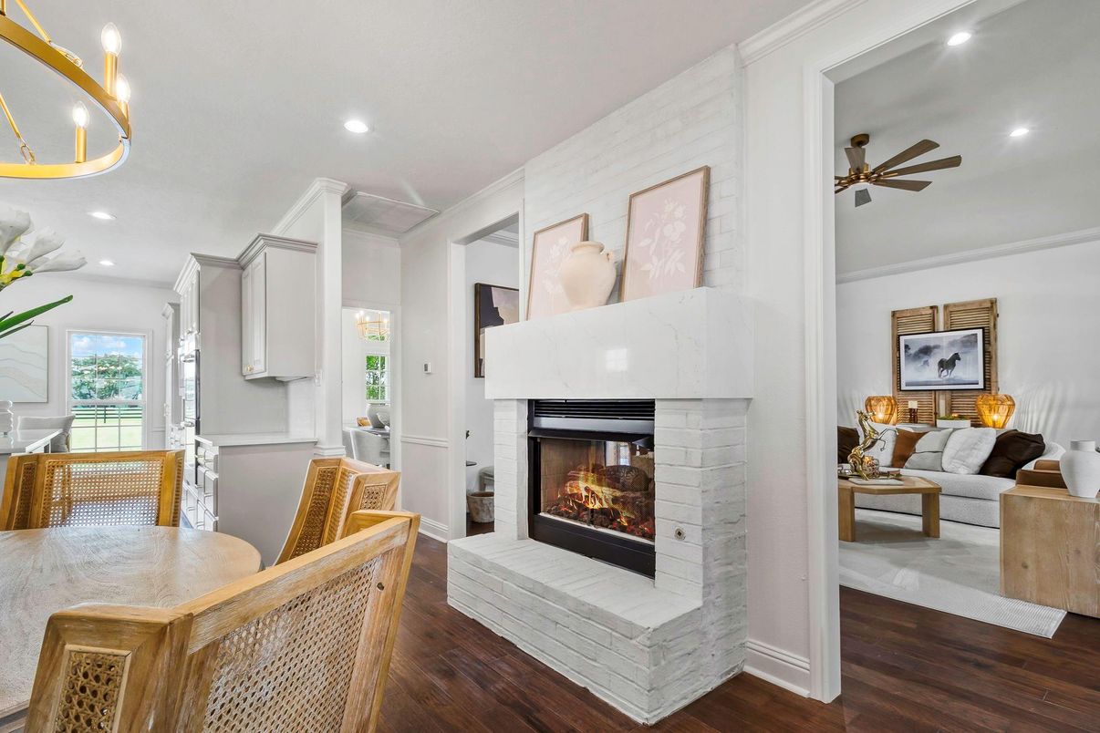 Dining room, Fireplace, Interior, Living room, Pendant Lights, Recessed Lighting, Wood Texture Flooring