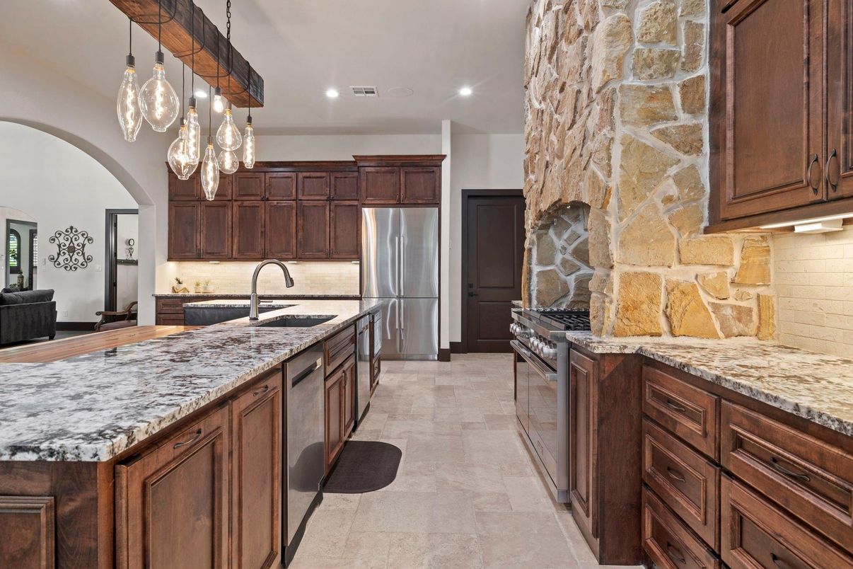 Interior, Kitchen, Pendant Lights, Recessed Lighting, Stainless Steel Appliances, Stone Walls