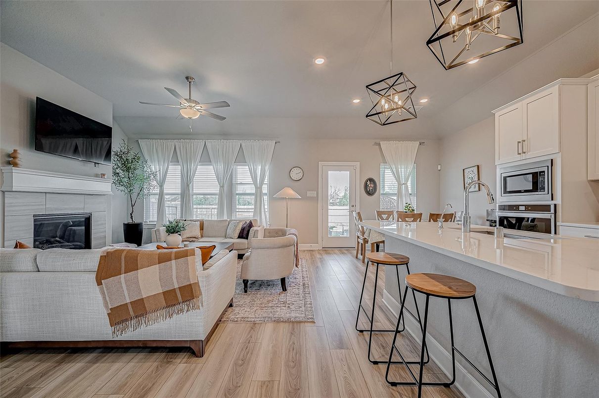 Fireplace, Interior, Kitchen, Living room, Pendant Lights, Recessed Lighting, Wood Texture Flooring
