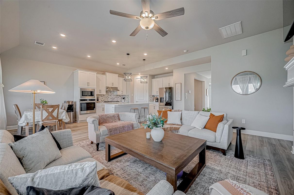 Dining room, Interior, Kitchen, Living room, Pendant Lights, Recessed Lighting, Stainless Steel Appliances, Wood Texture Flooring