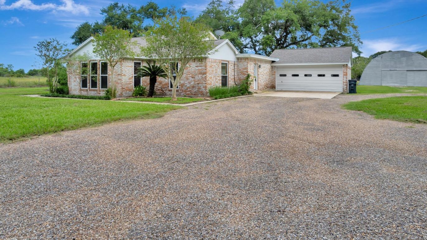 Attached, Backyard, Exterior, Facade, Brick Facade, Ranch