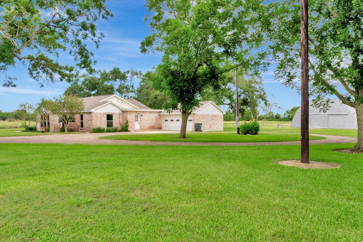 Attached, Backyard, Exterior, Facade, Brick Facade, Ranch