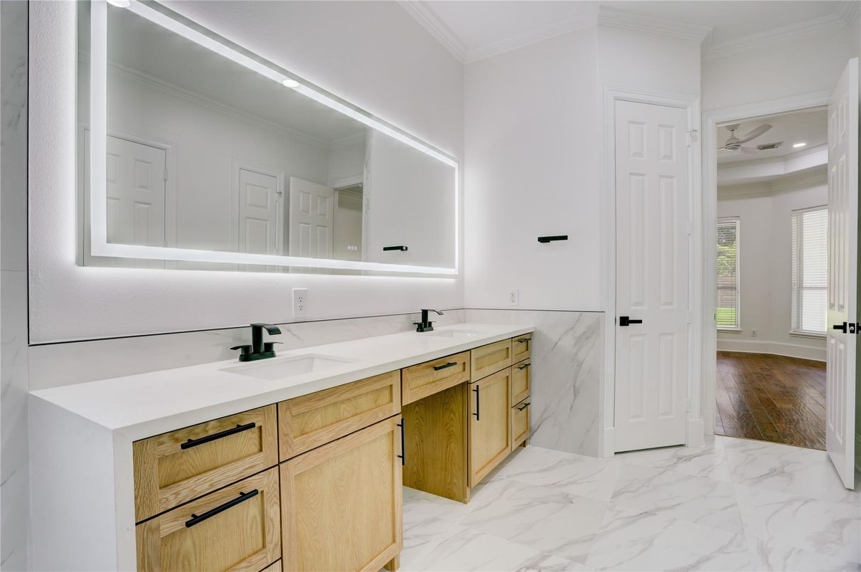 Bathroom, Dual Sink Vanities, Interior, Marble, Recessed Lighting, Wood Texture Flooring