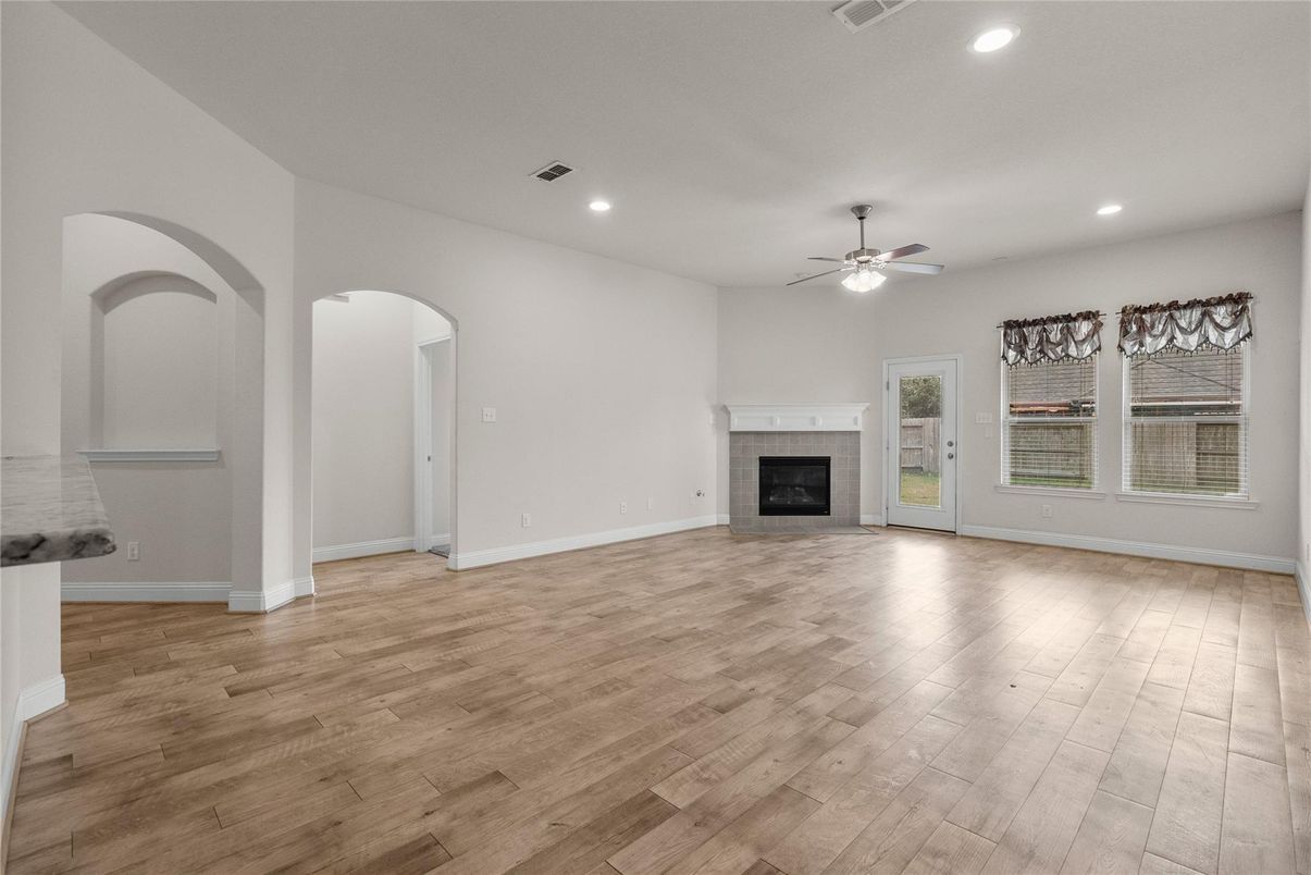 Empty room, Fireplace, Interior, Recessed Lighting, Wood Texture Flooring