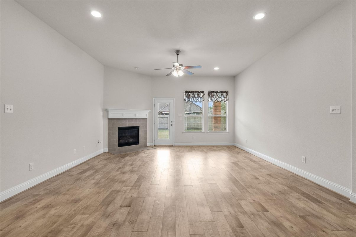 Empty room, Fireplace, Interior, Recessed Lighting, Wood Texture Flooring