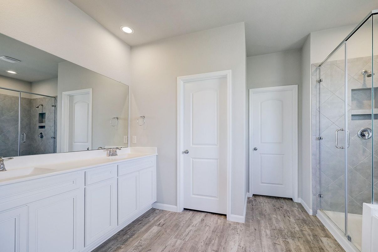Bathroom, Dual Sink Vanities, Glass Shower, Interior, Recessed Lighting, Wood Texture Flooring