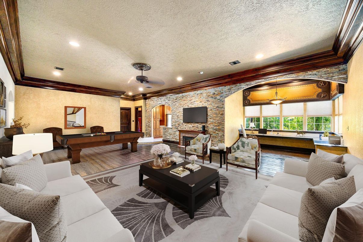 Billiard Table, Fireplace, Game Room, Interior, Living room, Recessed Lighting, Stone Walls, Wood Texture Flooring