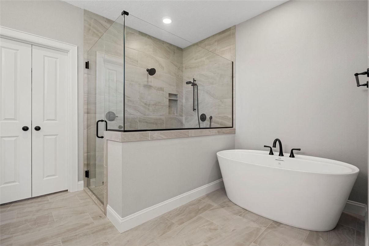 Bathroom, Free Standing Baths, Glass Shower, Interior, Marble Walls, Recessed Lighting