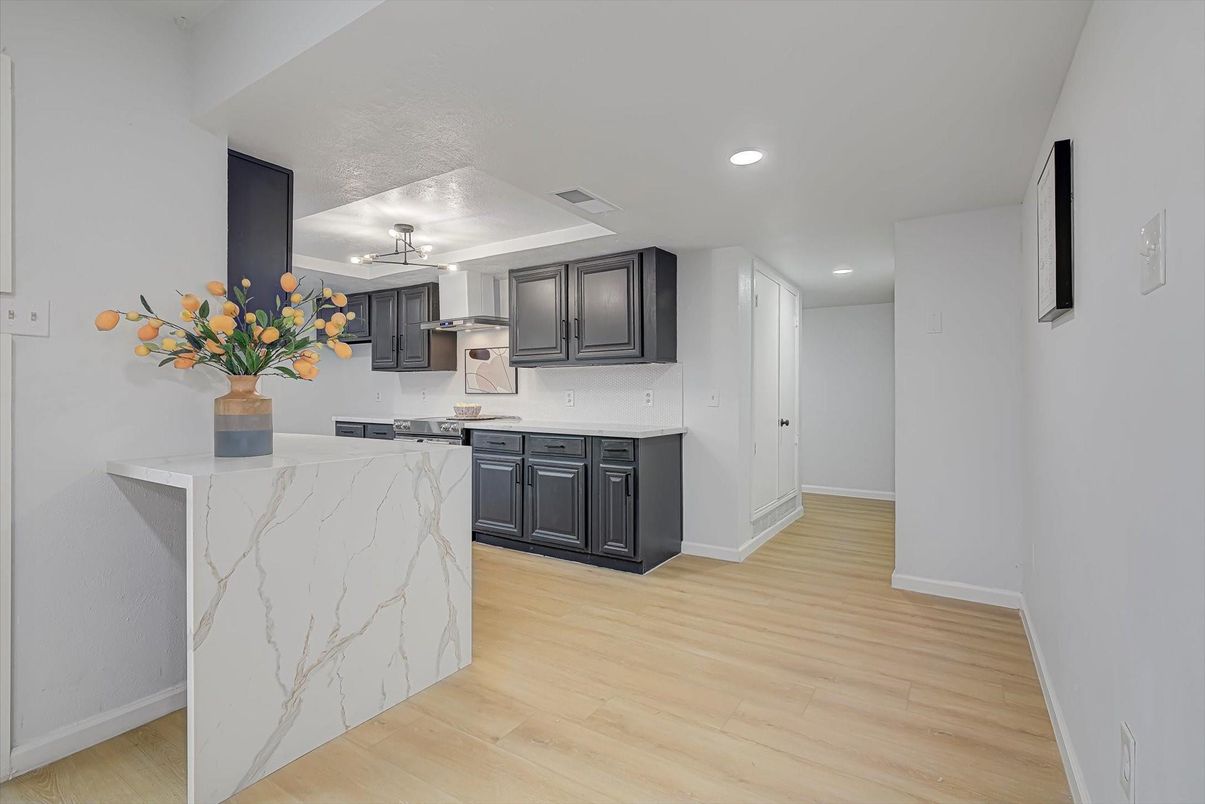 Interior, Kitchen, Marble Walls, Recessed Lighting, Wood Texture Flooring