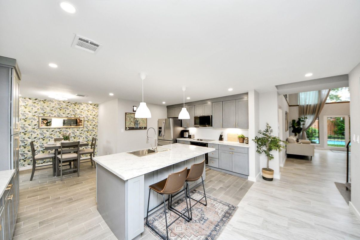 Dining room, Interior, Kitchen, Pendant Lights, Recessed Lighting, Stainless Steel Appliances, Wood Texture Flooring