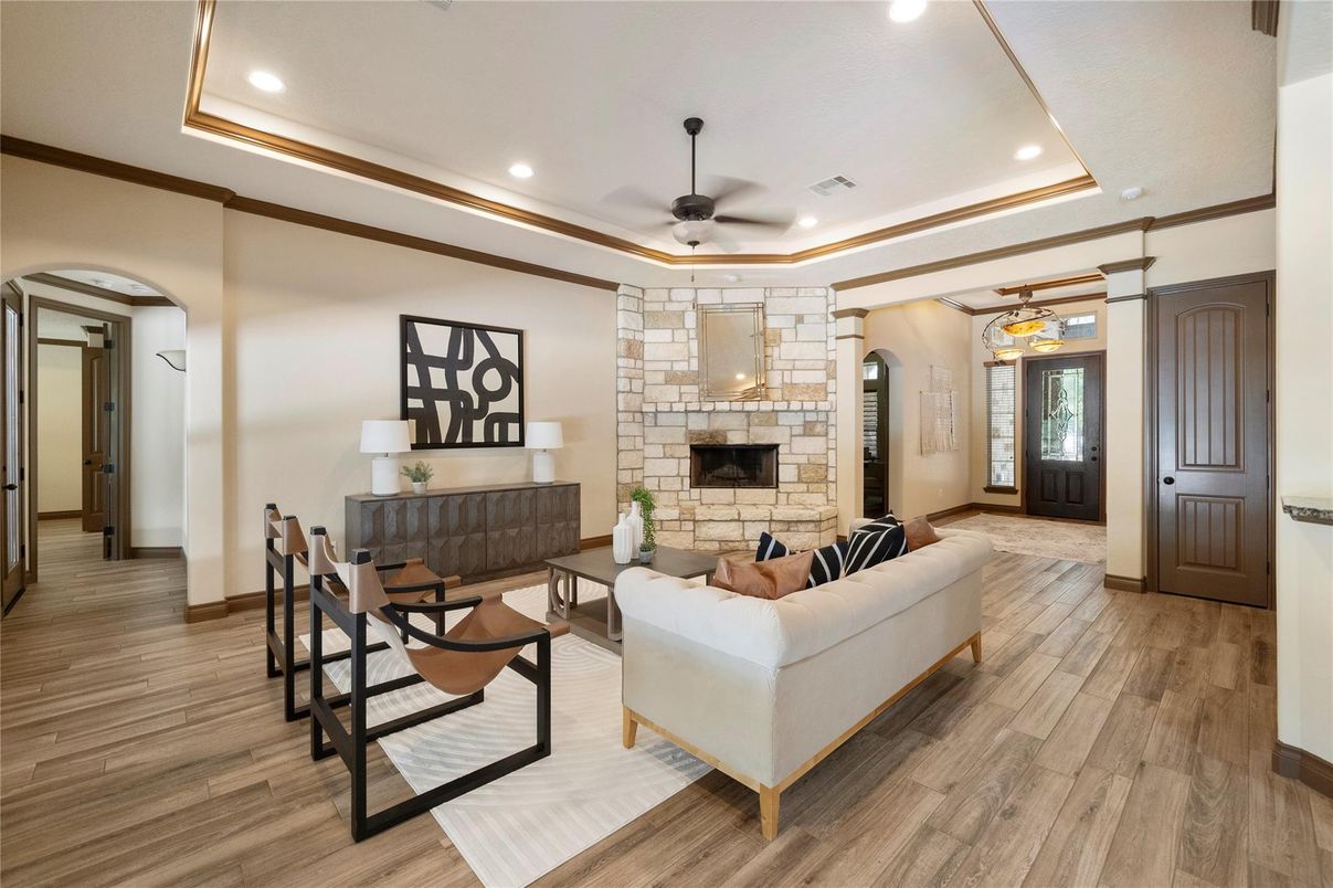 Fireplace, Interior, Living room, Recessed Lighting, Stone Walls, Wood Texture Flooring