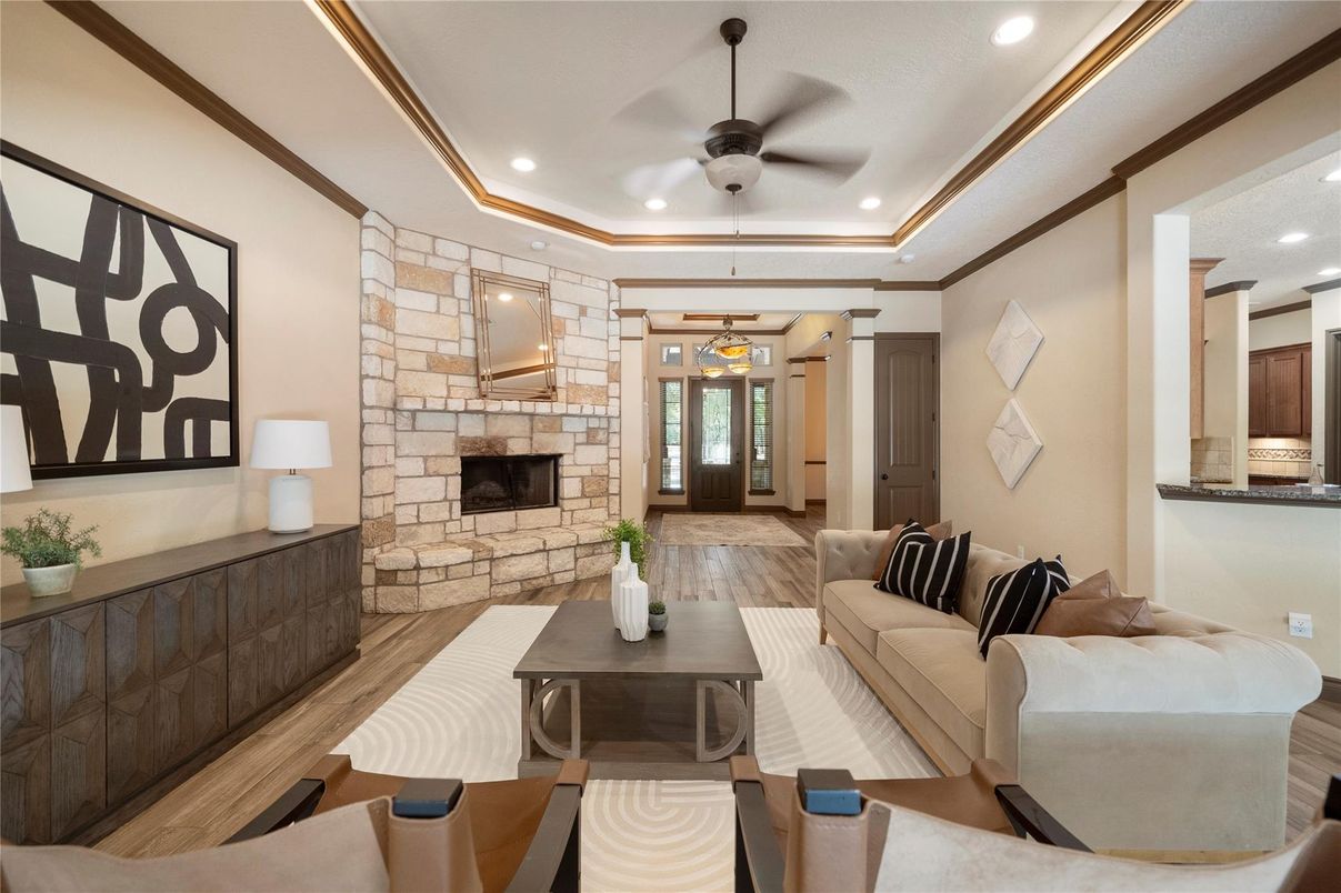Fireplace, Interior, Living room, Pendant Lights, Recessed Lighting, Stone Walls, Wood Texture Flooring