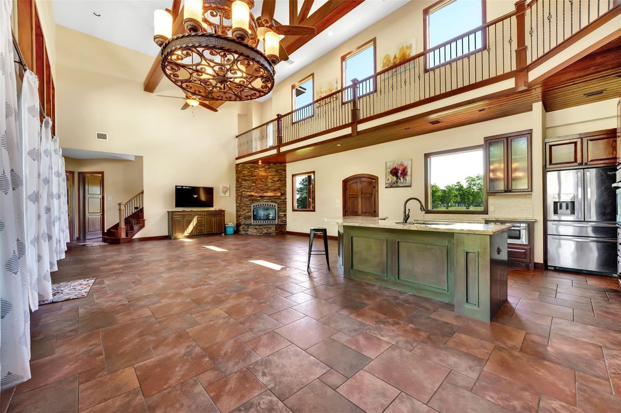 Chandelier, Fireplace, Interior, Kitchen, Recessed Lighting, Stainless Steel Appliances, Wooden Beams