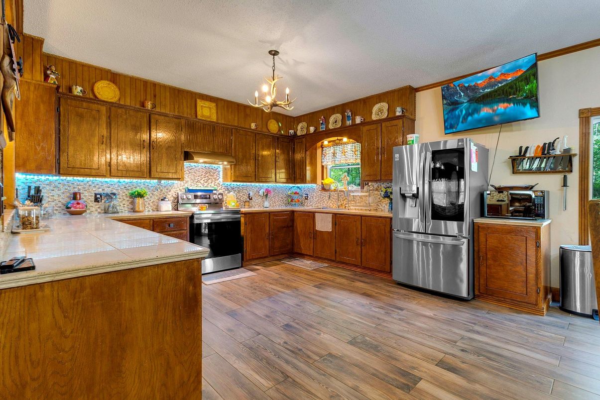 Chandelier, Interior, Kitchen, Pendant Lights, Tile Countertops, Wood Texture Flooring