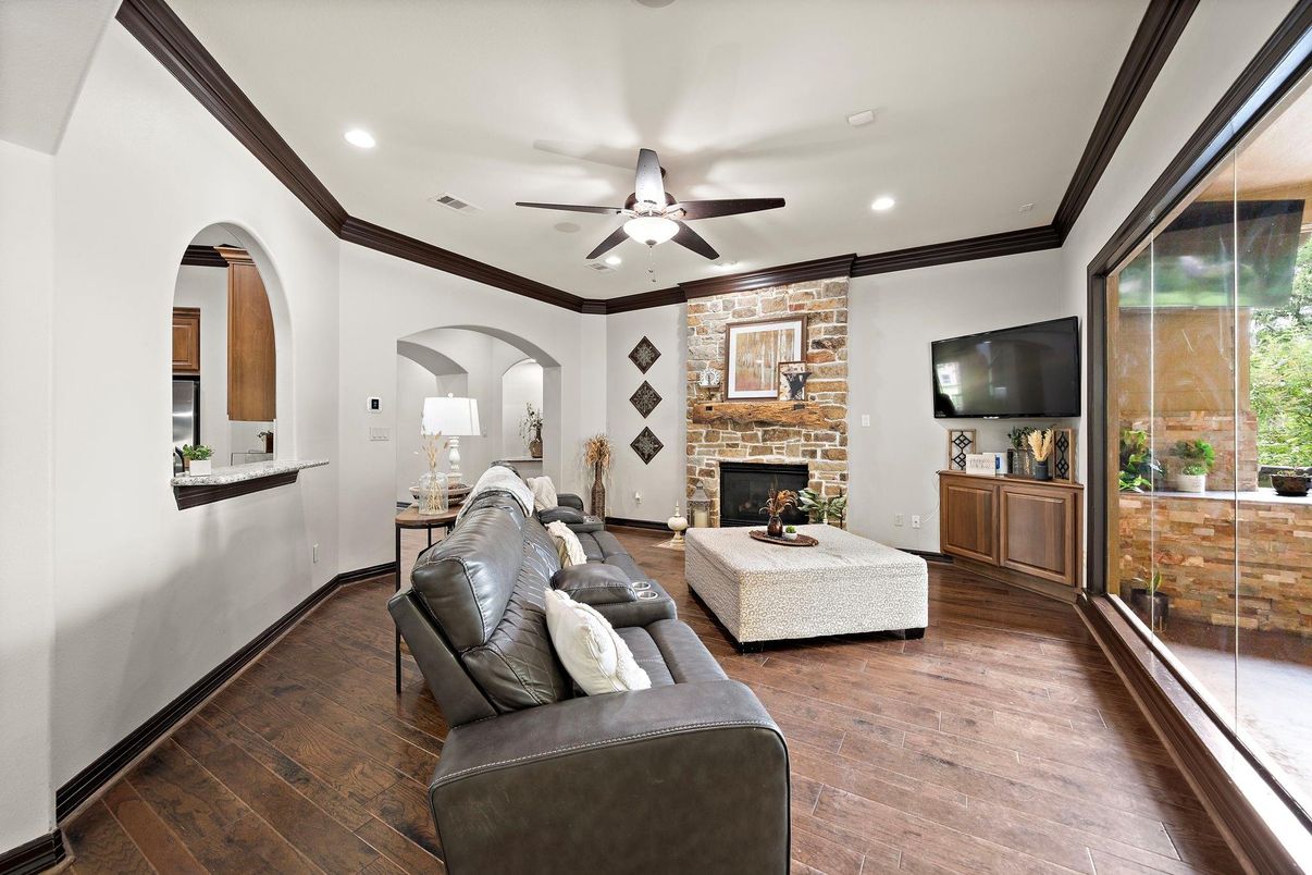 Fireplace, Interior, Living room, Recessed Lighting, Stone Walls, Wood Texture Flooring