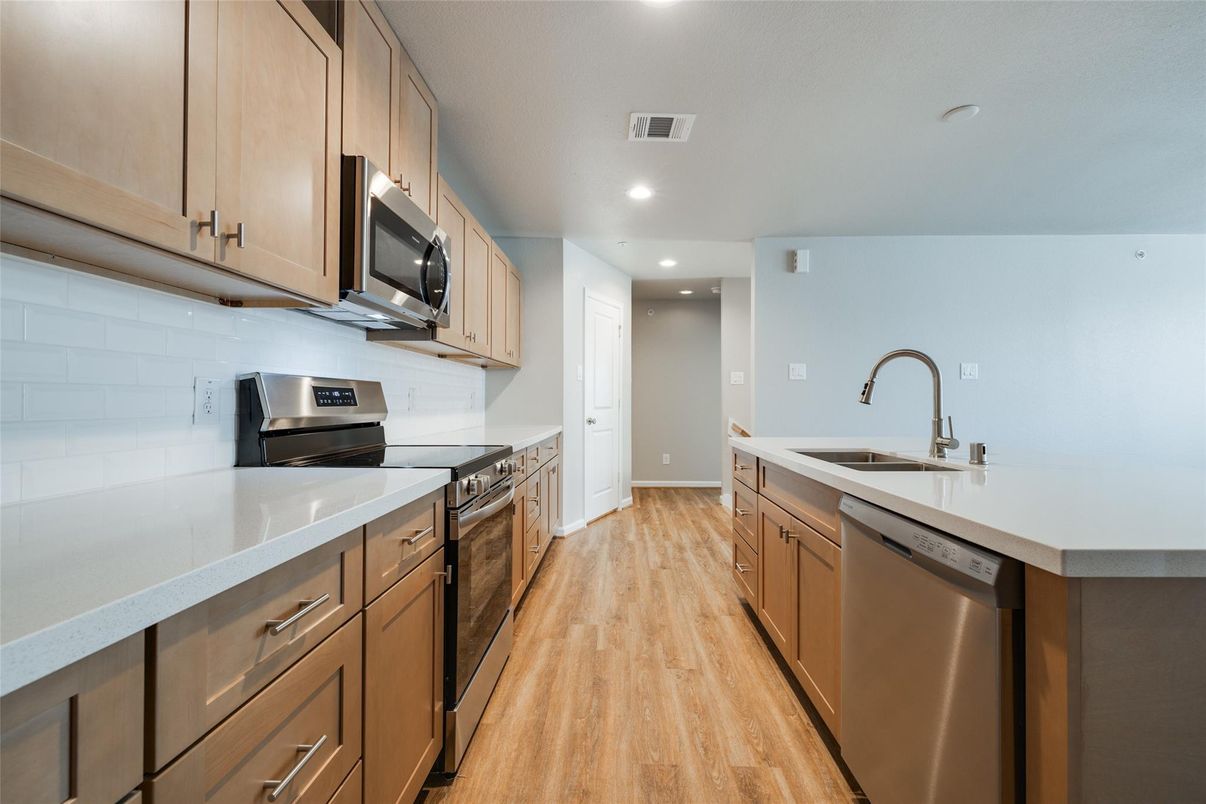 Interior, Kitchen, Recessed Lighting, Stainless Steel Appliances, Wood Texture Flooring