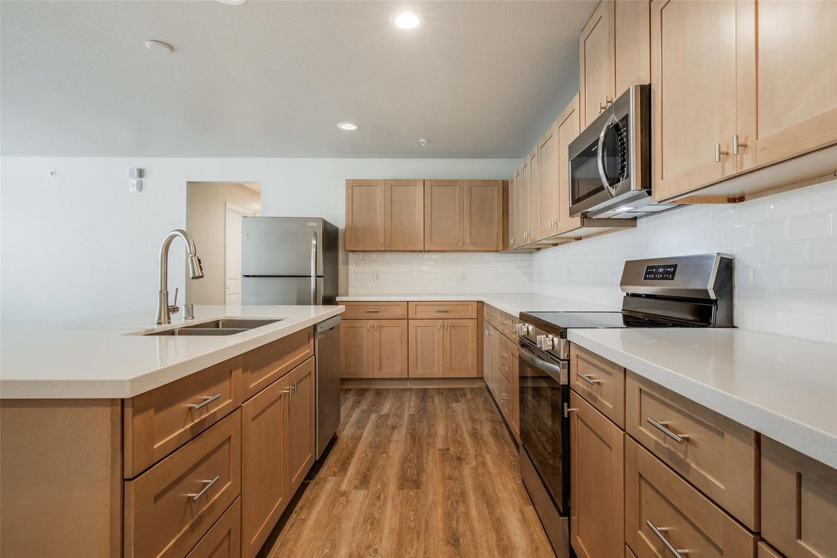 Interior, Kitchen, Recessed Lighting, Stainless Steel Appliances, Wood Texture Flooring