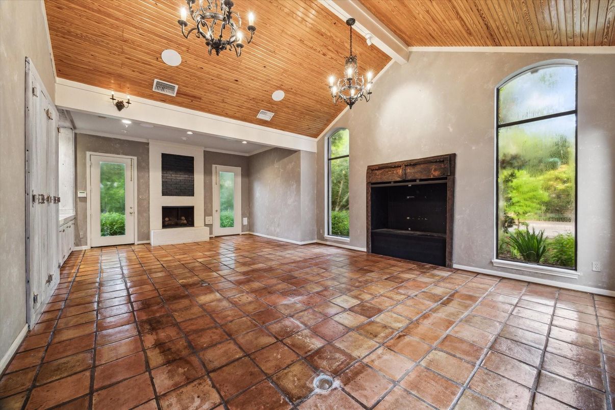 Chandelier, Empty room, Fireplace, Interior, Recessed Lighting, Wooden Ceilings