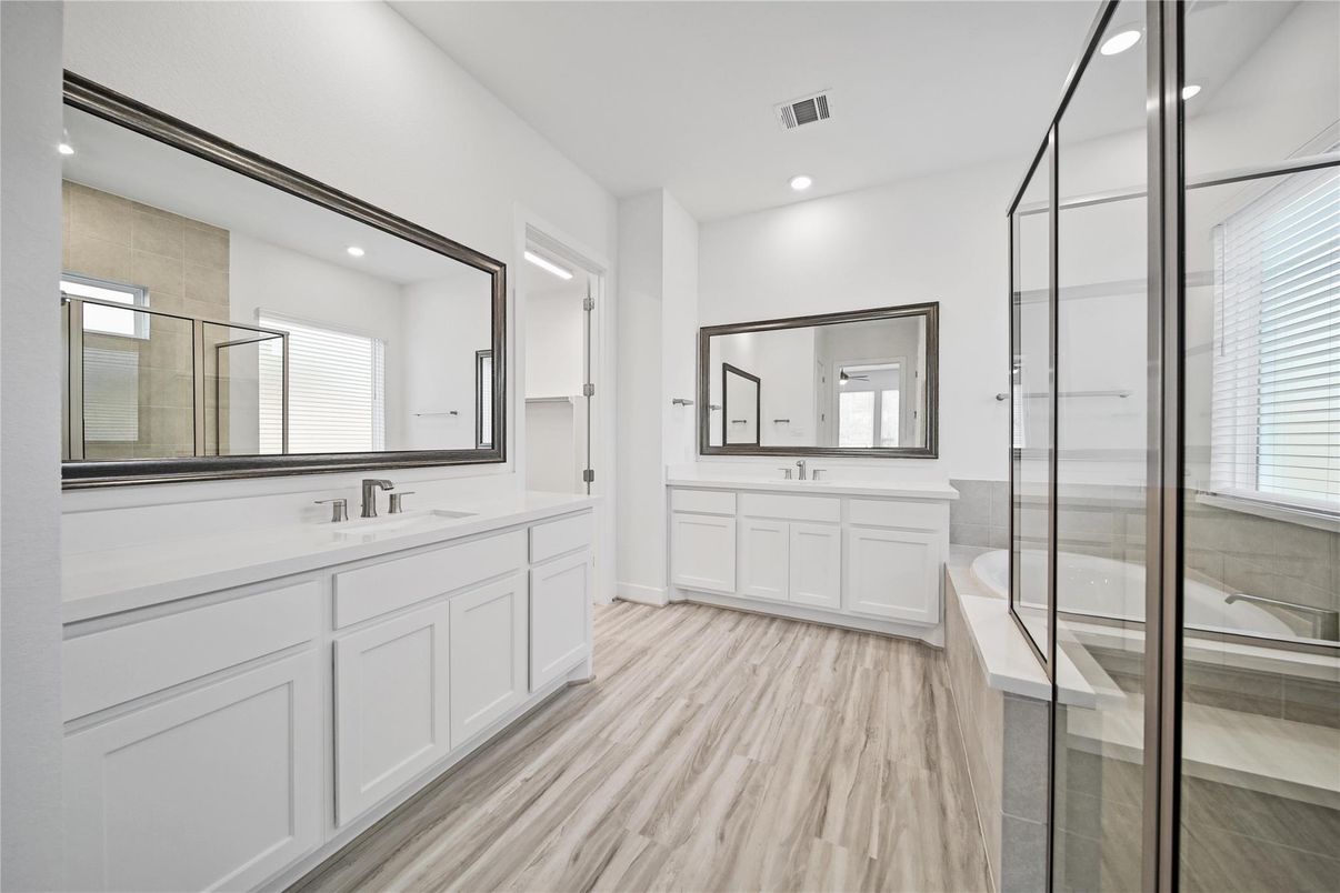 Bathroom, Dual Sink Vanities, Glass Shower, Interior, Recessed Lighting, Wood Texture Flooring