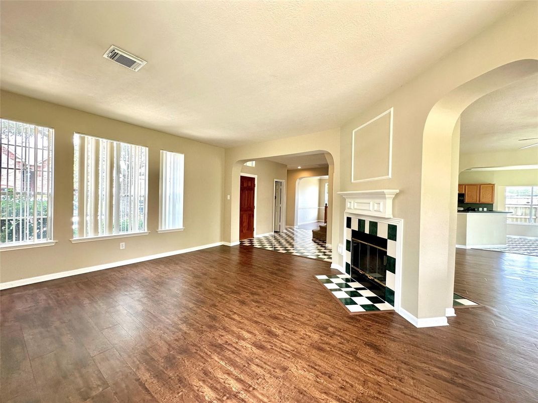 Empty room, Fireplace, Interior, Recessed Lighting, Wood Texture Flooring