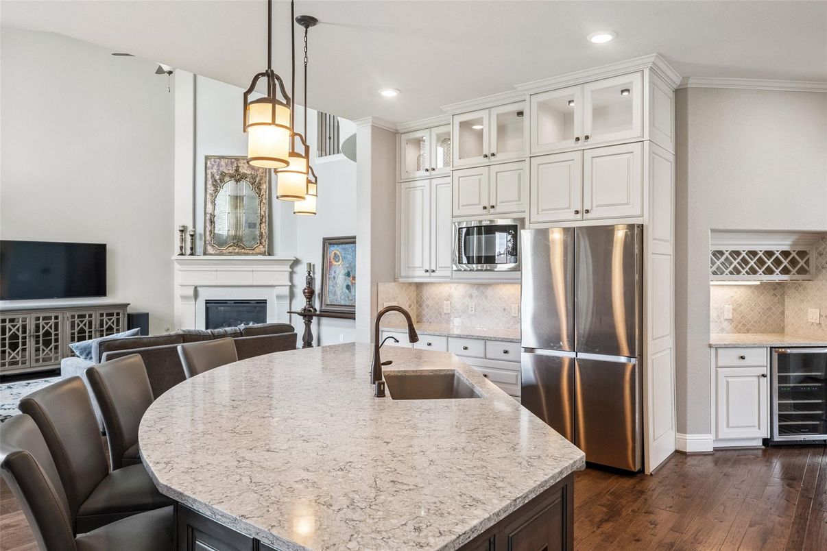 Fireplace, Interior, Kitchen, Pendant Lights, Recessed Lighting, Stainless Steel Appliances, Wood Texture Flooring