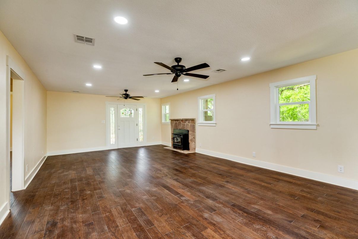 Empty room, Fireplace, Interior, Recessed Lighting, Wood Texture Flooring