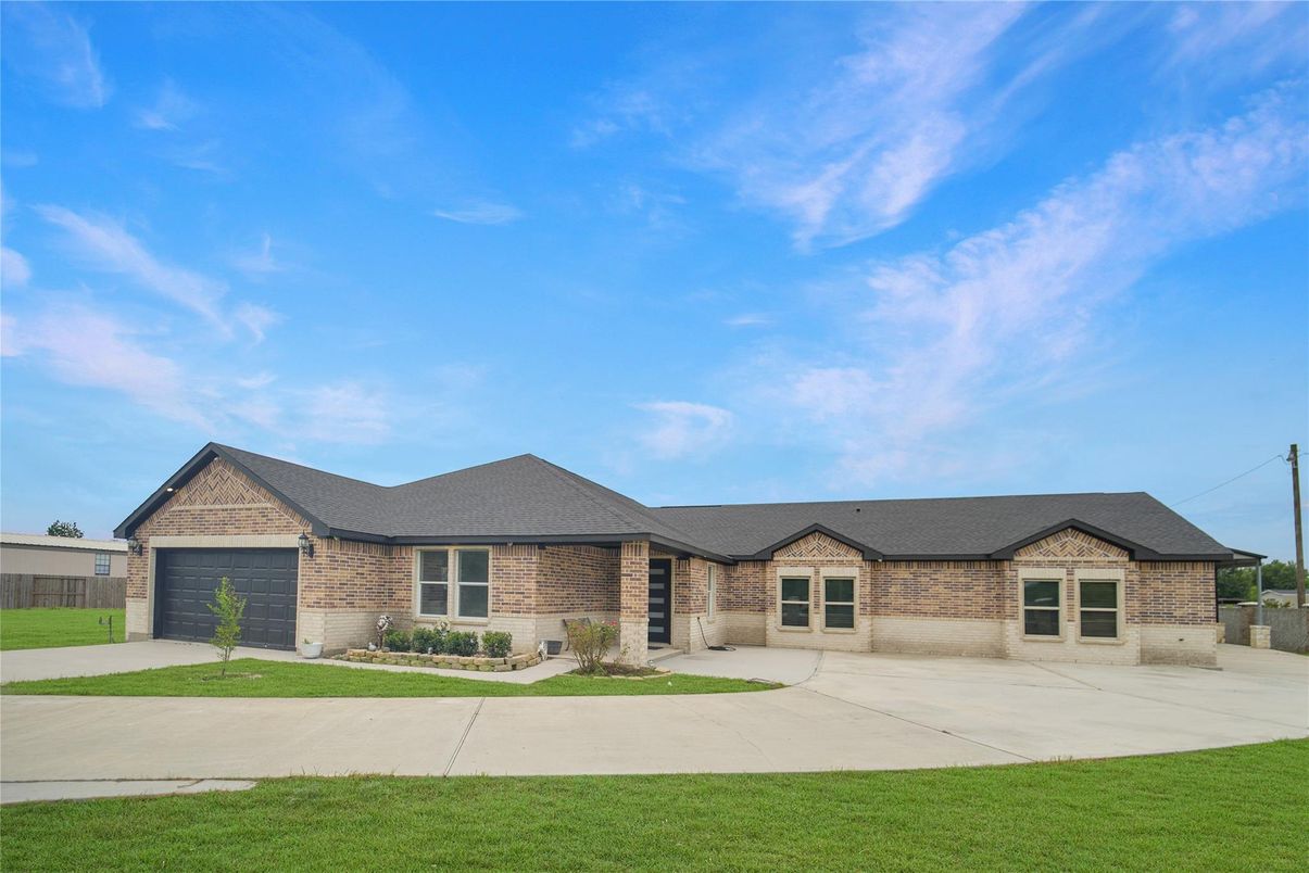 Attached, Backyard, Exterior, Facade, Brick Facade, Ranch