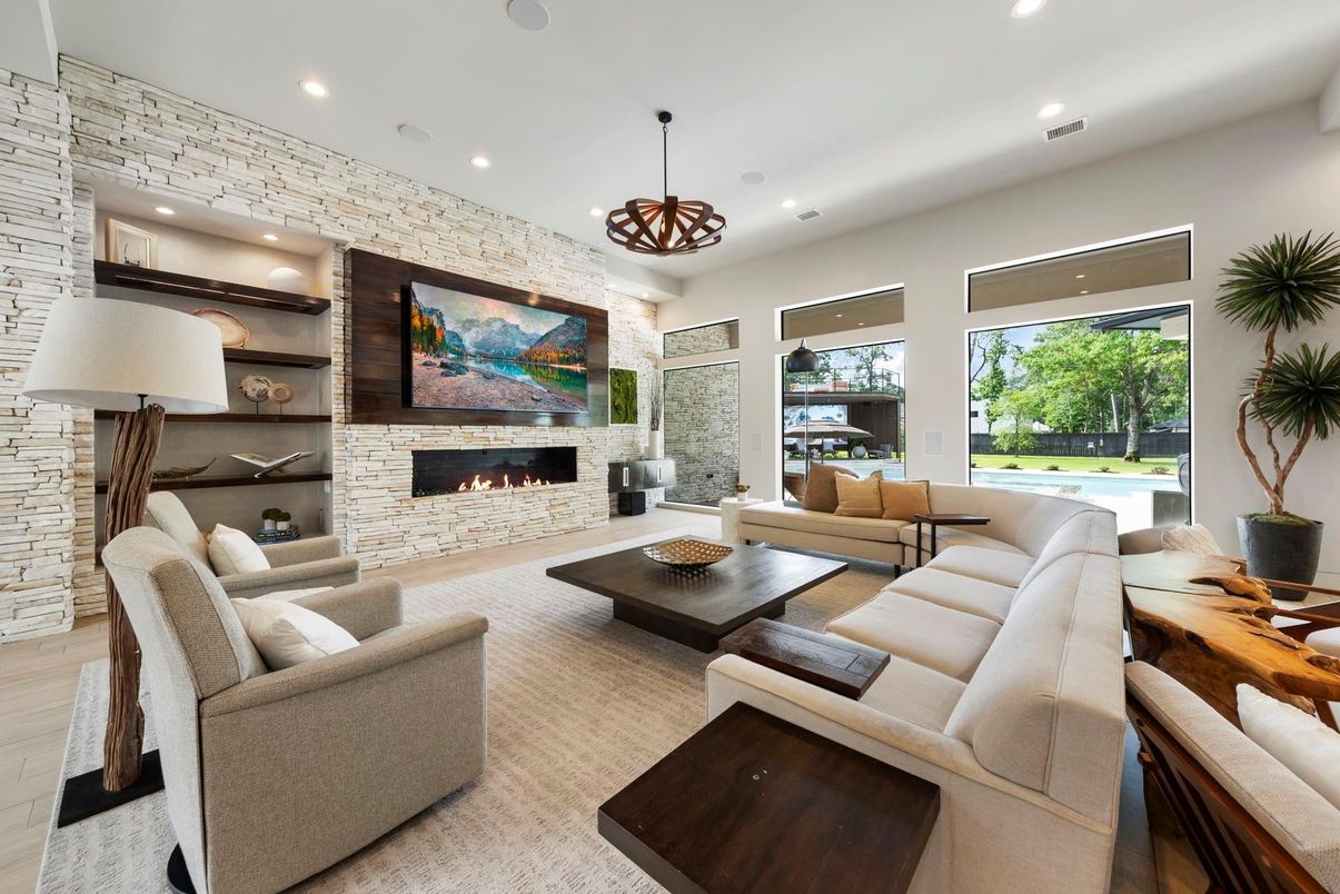 Fireplace, Interior, Living room, Pendant Lights, Recessed Lighting, Stone Walls, Wood Texture Flooring