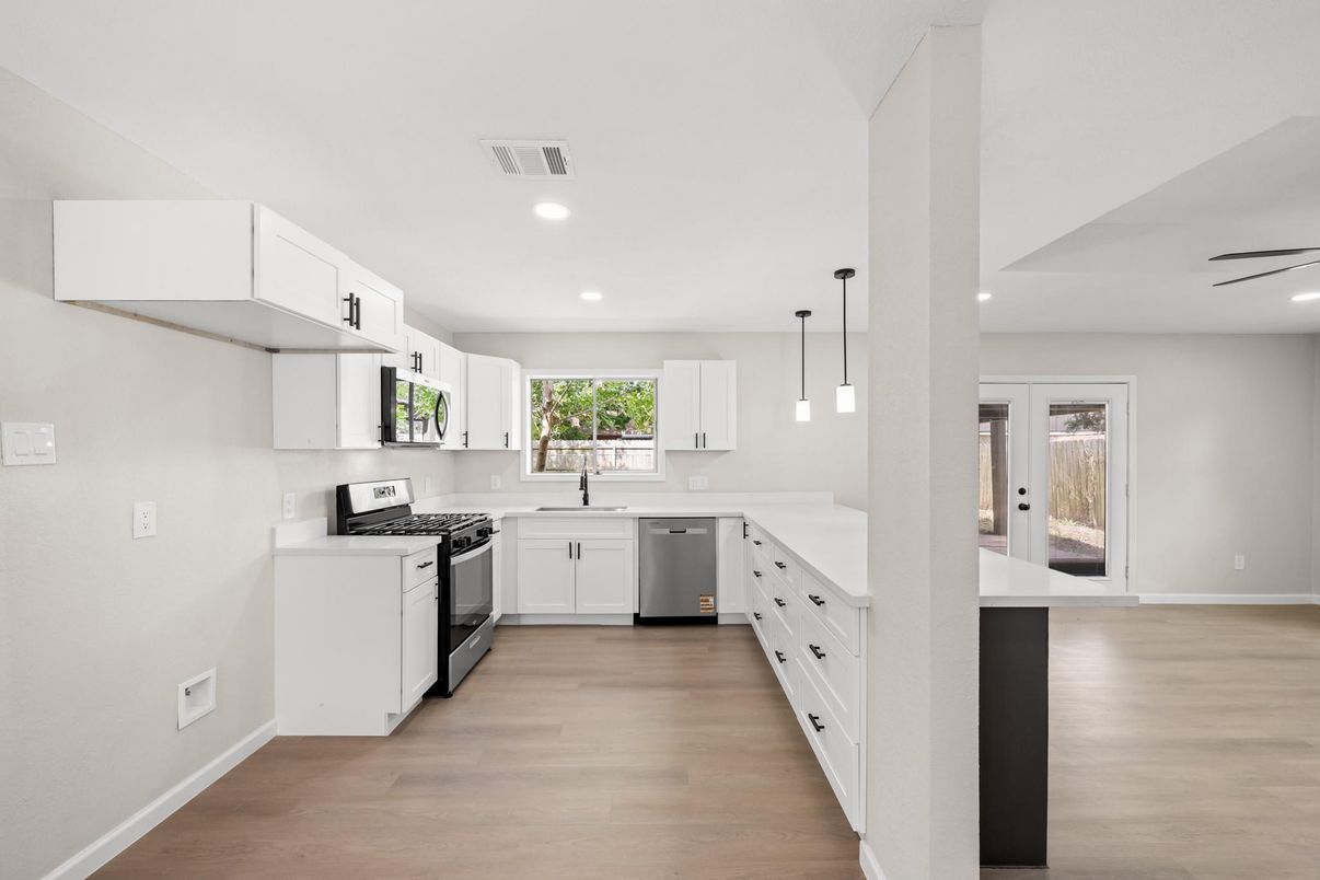 Interior, Kitchen, Pendant Lights, Recessed Lighting, Stainless Steel Appliances, Wood Texture Flooring