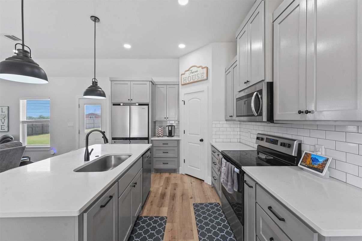Interior, Kitchen, Pendant Lights, Recessed Lighting, Stainless Steel Appliances, Wood Texture Flooring