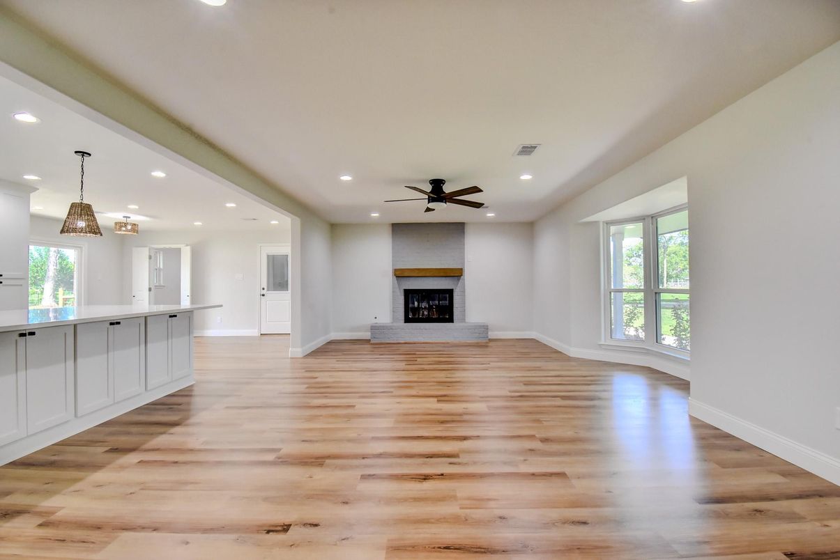 Empty room, Fireplace, Interior, Pendant Lights, Recessed Lighting, Wood Texture Flooring