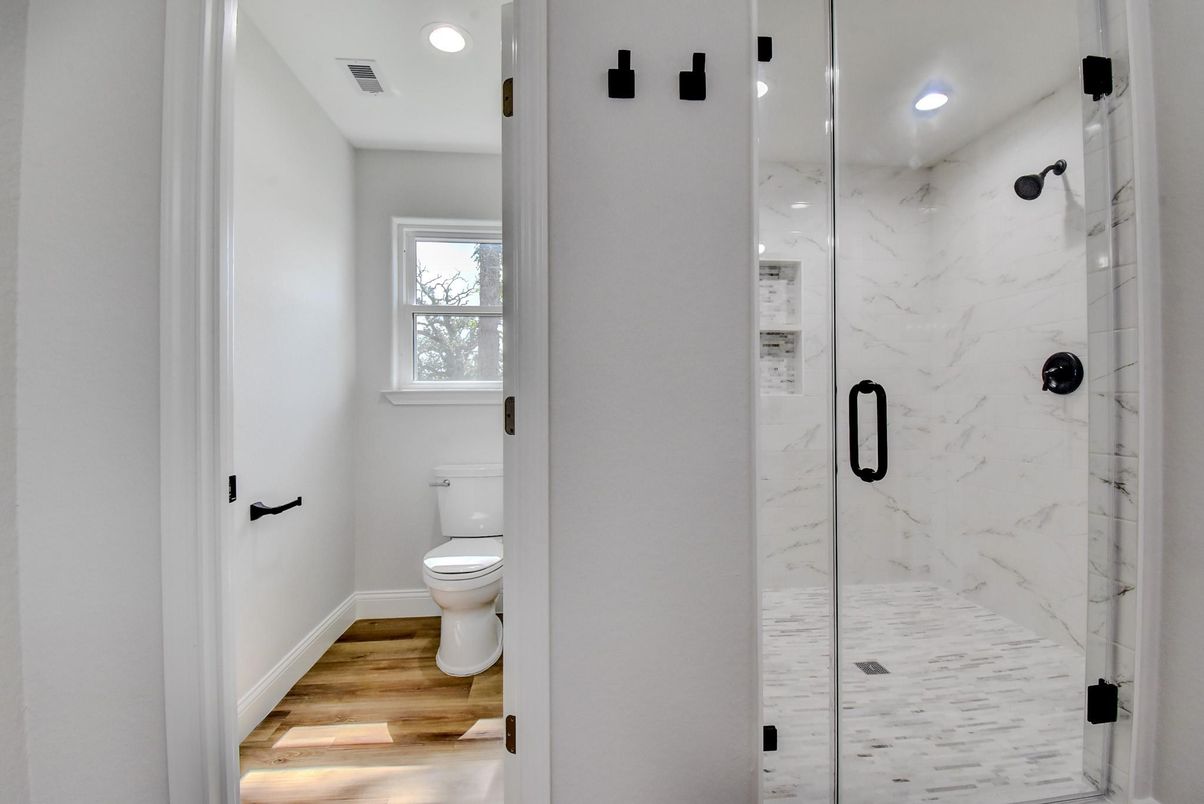 Bathroom, Glass Shower, Interior, Marble Walls, Recessed Lighting, Wood Texture Flooring