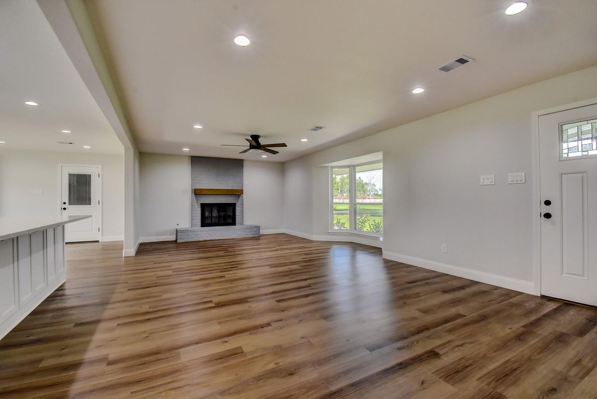 Empty room, Fireplace, Interior, Recessed Lighting, Wood Texture Flooring