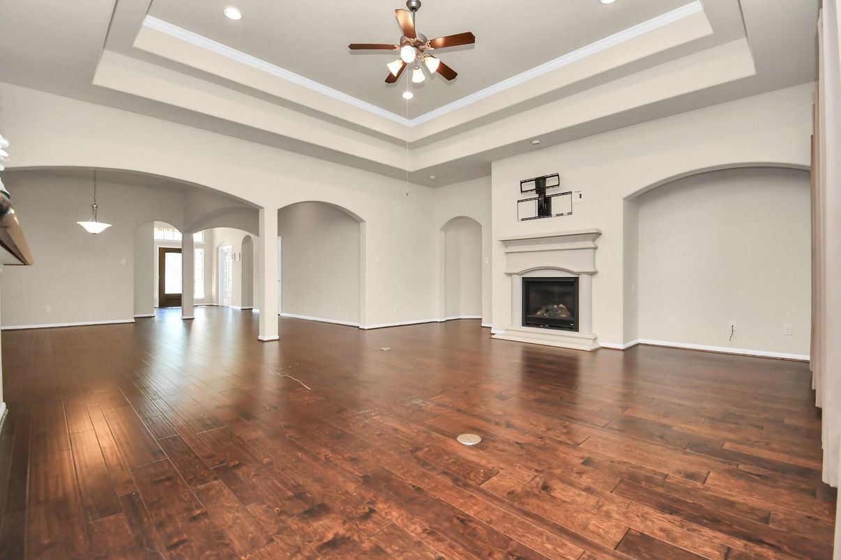 Empty room, Fireplace, Interior, Pendant Lights, Recessed Lighting, Wood Texture Flooring