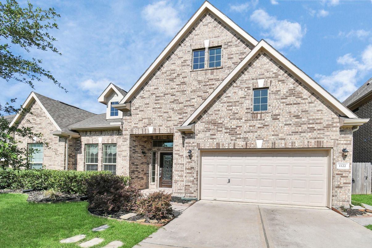 Attached, Exterior, Facade, Brick Facade, Brick Traditional
