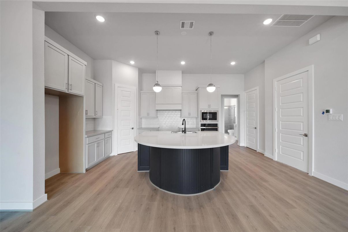 Interior, Kitchen, Pendant Lights, Recessed Lighting, Stainless Steel Appliances, Wood Texture Flooring