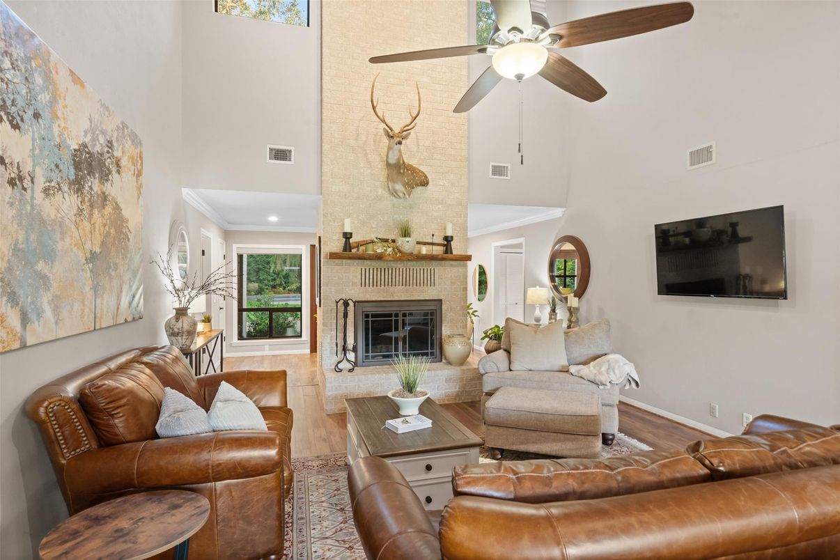 Fireplace, Interior, Living room, Recessed Lighting, Stone Walls, Wood Texture Flooring
