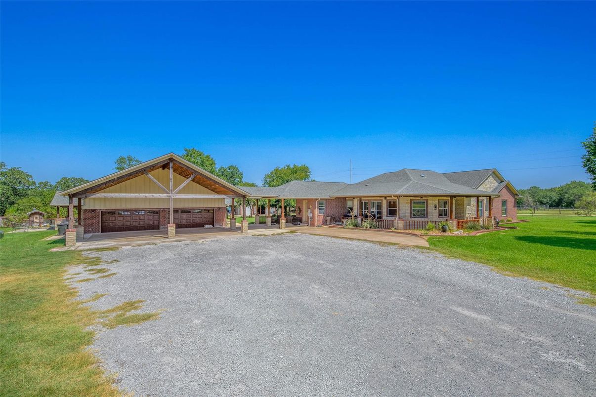 Attached, Backyard, Exterior, Facade, Brick Facade, Ranch